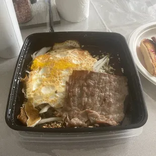 Over cooked egg ( definitely not fried) and bland dry carne.