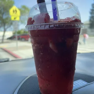 a drink in a plastic cup