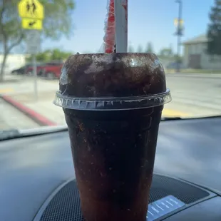 a drink in a plastic cup