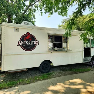 a food truck parked on the side of the road
