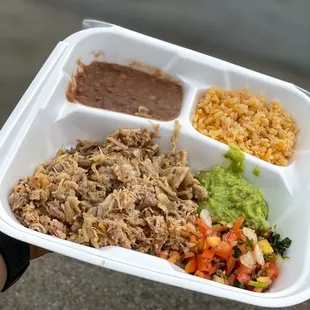 Carnitas Plate: maciza (pork shoulder), buche (pig gut), cuerritos (pig skin), rice, beans, guacamole, pico de gallo