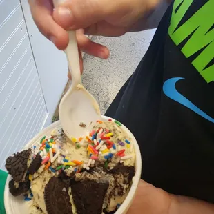 Oreo ice cream with oreo pieces and sprinkles