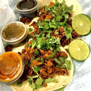 Pastor Tacos with three special sauces