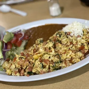 Huevos a la Mexicana with handmade corn tortillas and a side salad instead of rice. Absolutely divine