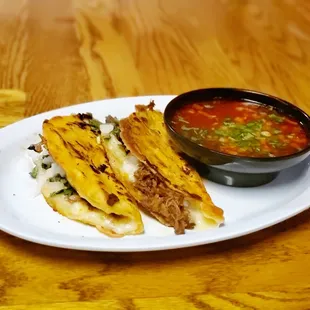 Quesibirria tacos $3.75ea. Plate of 2 with both $ 9.99 Friday Special $7.99