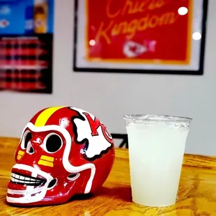 a drink and a skull