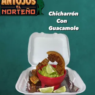 a bowl of guacamole and pretzels