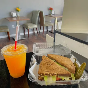 Turkey &amp; panela sandwich with freshly squeezed orange juice