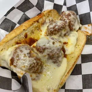 a meatball sub in a basket