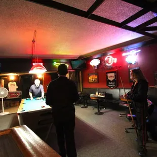 a man and a woman in a bar
