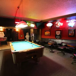a pool table in a bar
