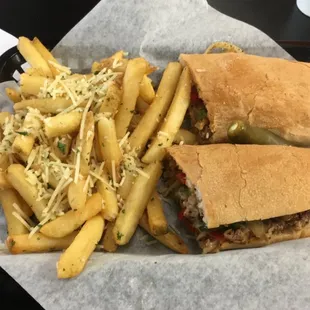 Tex Mex Sandwich w/ Fries topped with parmesan cheese