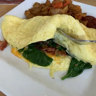 Omelette w half cooked spinach