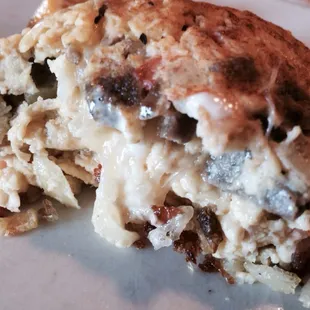 The inside of my Mediterranean Omelette! Gyro, Onion, tomatoes, Swiss cheese &amp; tzatziki sauce. So delicious.