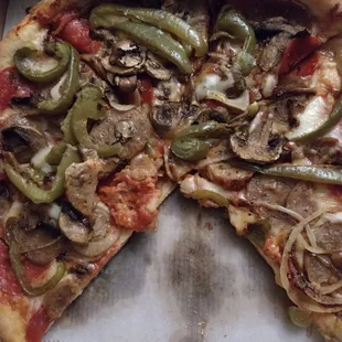 a whole pizza in a box