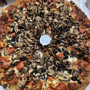 Well done XL pepperoni pizza with olives, and extra mushrooms