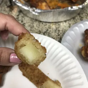 Cold mozzarella sticks, put them in the oven and they were okay.