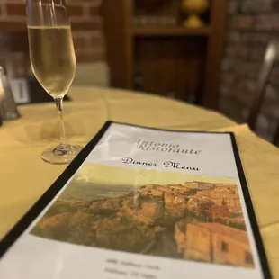 a glass of wine on a table