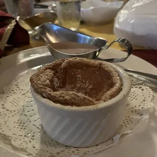 This is how they served the souffle, a sunken chocolate scrambled egg.