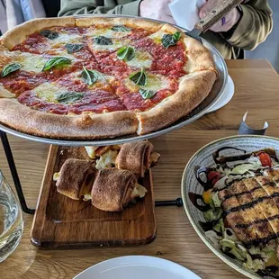 New York Margherita pizza, parm chicken chop salad, pepperoni rolls.