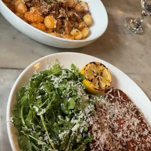 Duck gnocchi and crusted chicken with Arugula Salad