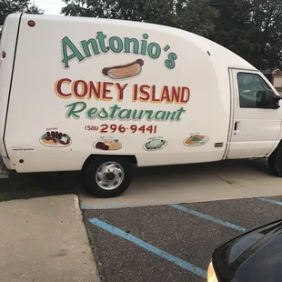 The place much nicer than old truck advertising in corner of small mall