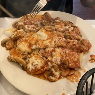 You want veal? He said this was delicious, came w large sliced mushrooms, mozzarella and ziti and linguini.