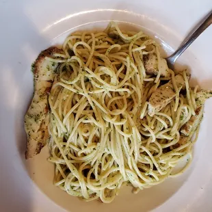 Custom pasta dish- angel hair pasta with pesto sauce and grilled chicken