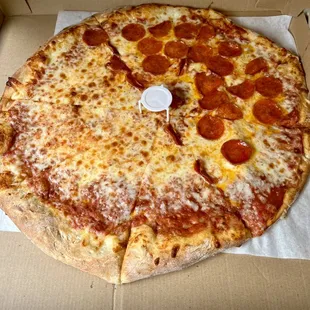 $9.99 special (additional charge for 1/2 pepperoni) -- fresh, hot delicious pizza and very friendly service
