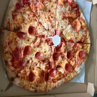 18" XL pizza -- part cheese, part pepperoni
