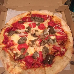 Pepperoni, sausage, and onion.   A little disappointing