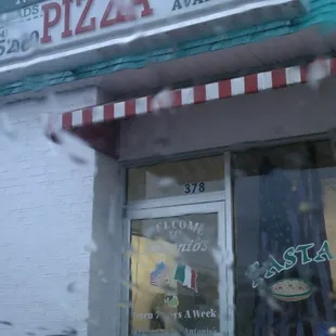 Storefront, in the rain