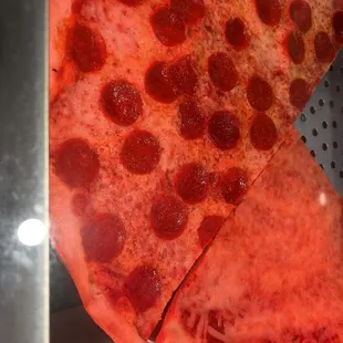 Pizza.  Under the lights. Wish this wasn&apos;t so red.