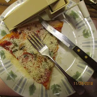 One slice of pizza with my own Parmesan added.