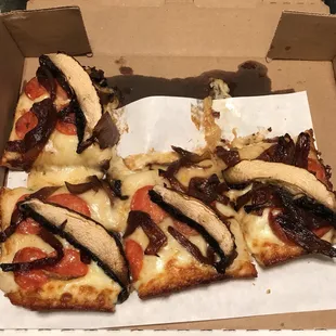 a slice of mushroom pizza