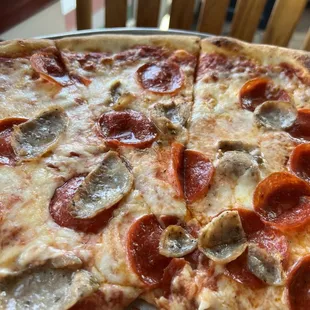 Large pepperoni and sausage pizza