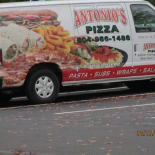 Antonio's Pizza: Rolling stock. I saw no indication of delivery, so I'm guessing the van is used for catering.