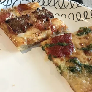 two slices of pizza on a plate