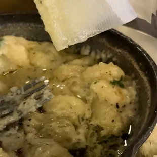 Gnocchi swimming in grease