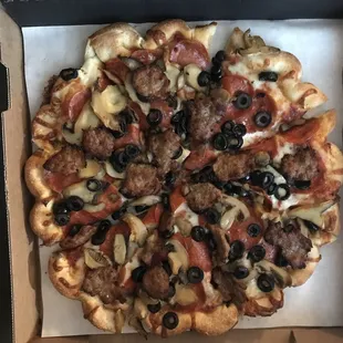 This pie is pretty good. A make my own special. Interesting twist on the surrounding crust.....