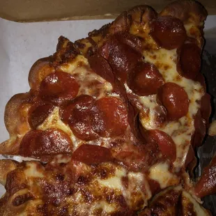 a slice of pepperoni pizza
