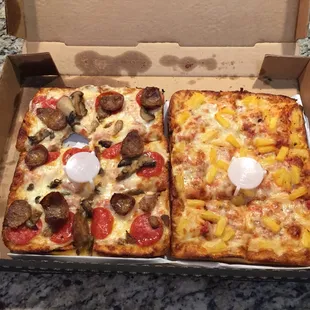 Large Sicilian Square, 1/2: spicy sausage, mushroom, &amp; extra cheese, 1/2: extra cheese &amp; pineapple. Delicious!