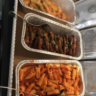 Family meal to go. Cutlets, salad, pasta, breadsticks. Packaged well and warm.