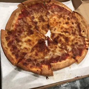 So not only did they forget half my order when I got my pizza this is what it looked like ! Manager was so rude !