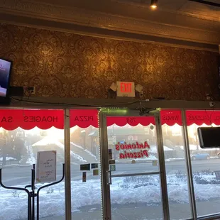 Inside looking out - cool wall paper and old-timey ceiling.