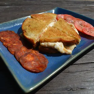 Spaniard style pork chorizo grill cheese sandwich on sourdough bread, olive oil.....