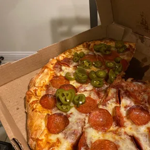 a pepperoni and jalapeno pizza