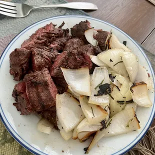 Tenderloin ends and grilled onions.