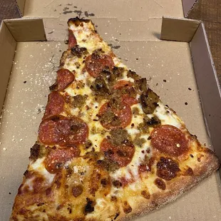 Super size pepperoni and sausage pizza slice $5.41 after tax!