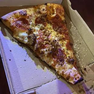 Super size pepperoni and sausage pizza slice $5.41 after tax!